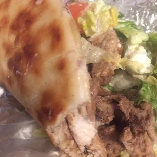 a close up of a pita sandwich