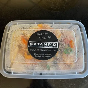 a plastic container with food in it