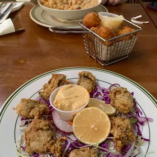 6 fried oysters, hush puppies w/honey butter, Mac n cheese...