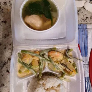 $8.99 combo-shrimps with veggies in coconut sauce, chicken with greens soup, and steamed rice.