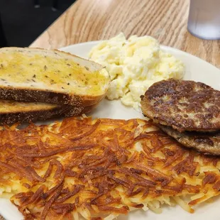 Egg whites, sausage, rye bread, and hash browns