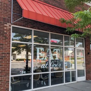 Front entrance. Tucked behind CVS.