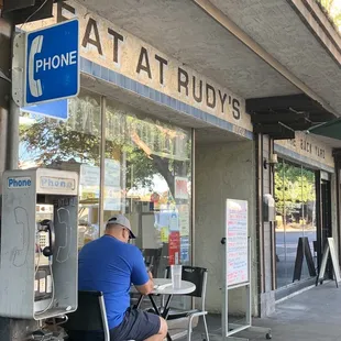They still have the same payphone outside.