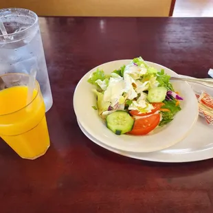 Salad  &amp; orange juice.
