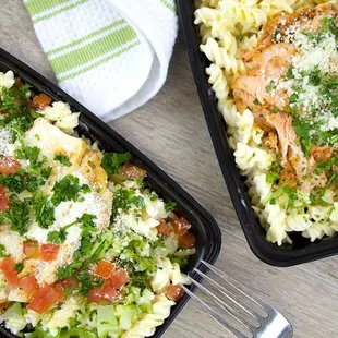 two takeout containers of food