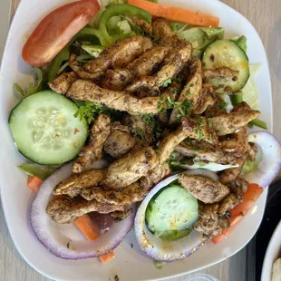Grilled chicken on salad