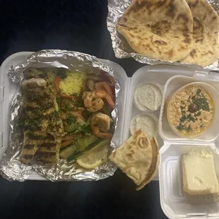 Chicken &amp; Shrimp w/ fresh sautéed veggies, 2 pitas. tzatziki sauce ( small cups), spinach veggie dip (spicy), slice of plain cheese cake