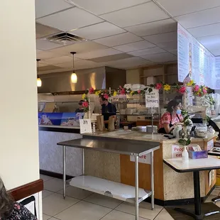 Ordering area: Rima takes your order.