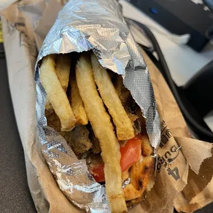 Hand held regular gyro w lamb (fries are in the wrap w the meat