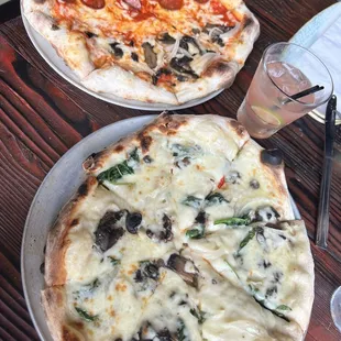 The basic pizza with half pepperoni and peppers and half mushroom and onion. Also the tree hugger pizza. Drink is the guava margarita.