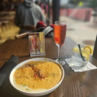 Seafood shrimp and grits with a cranberry mimosa.