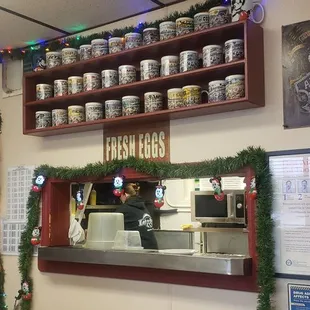 a restaurant counter and shelves