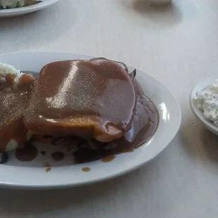 HotBeef Sandwhich, mash potatoes smothered in brown gravy and cottage cheese!