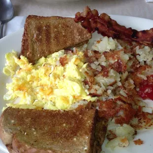 Breakfast Special - 2 Eggs, Freshly made home fries, 2 pc, bacon and toast!