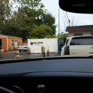 Park across the street if you don't plan on getting a car wash