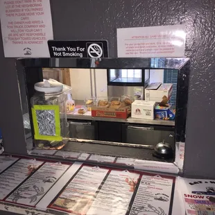 a counter with menus on it