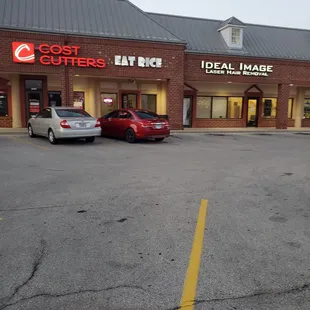 two cars parked in a parking lot