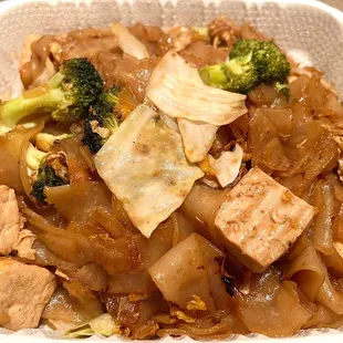 Pad See Ew with tofu. Cabbage, Chinese broccoli, and carrots with flat rice noodles. Love. I recommend trying it here.