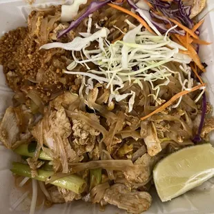 a chicken dish in a styrofoam container