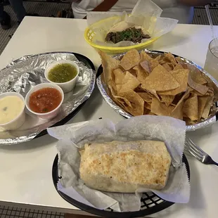 Chicken Burito, trio dips, steak taco