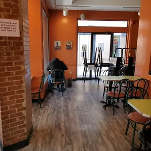 a man sitting at a table in a restaurant