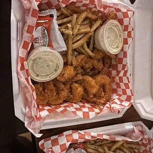 Lemon pepper catfish with fries. Fried shrimp with fries and red beans and rice! Everything was so great!