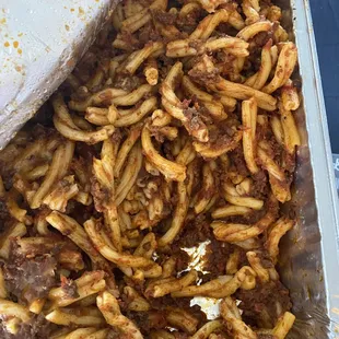 Strozzapreti Twisted Pasta with Salsa-mia (Italian sausage, ground beef, tomato sauce and wine).