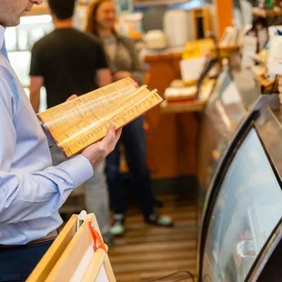 a man holding a sandwich