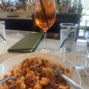 Pasta and aperol spritz