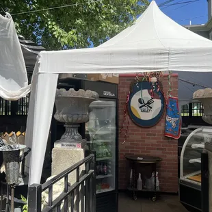 Outdoor entrance and piano