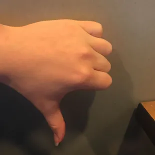 a person's hand reaching for something