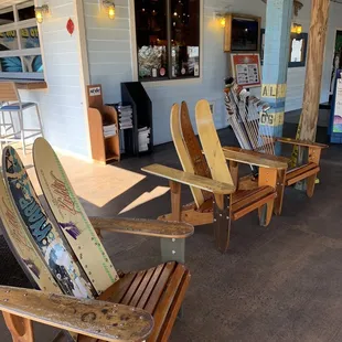 chairs with surfboards on them