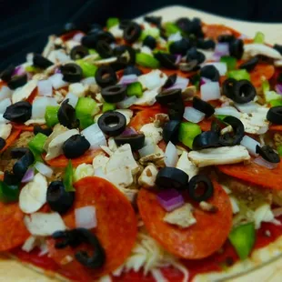 a pizza on a wooden board
