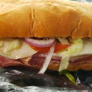 Looks nothing like the menu, skimpy toppings, no oil and dry with next to no spices.