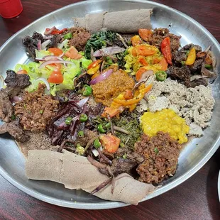 Vegetarian platter with several meat dishes