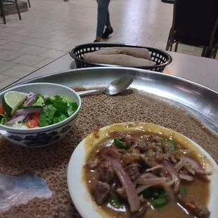 Juicy lamb, flat bread and a side salad. Or, at least that's what I could make out with my server's broken English.