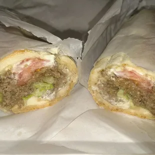Half of a steak sub, LTM fried onions