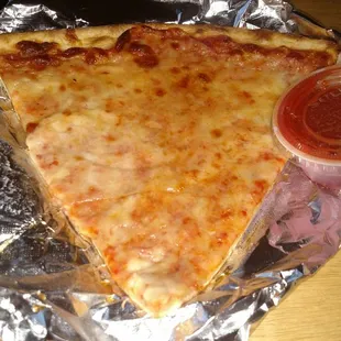 Slice of cheese with extra sauce