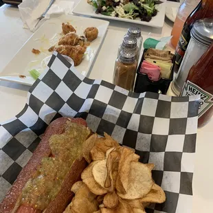 Fried hotdog on pretzel bun, boneless chicken nuggets, greens salad, and cream crab soup!