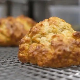 a close up of a pastry on a cooling rack