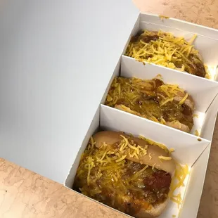 Hot dogs with chili and cheese + soda = $5