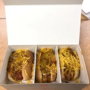 Hot dogs with chili and cheese + soda = $5