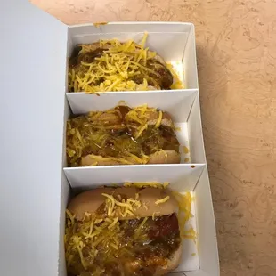Hot dogs with chili and cheese + soda = $5