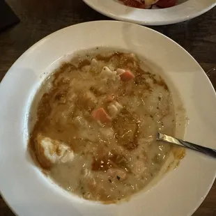 Seafood chowder in front goat cheese and heirloom tomatoes in the back.