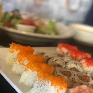 House salad, golden California roll, spicy tuna roll, beauty on the beach roll