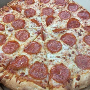 a pepperoni pizza in a box