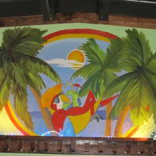 a mural on the wall of a restaurant