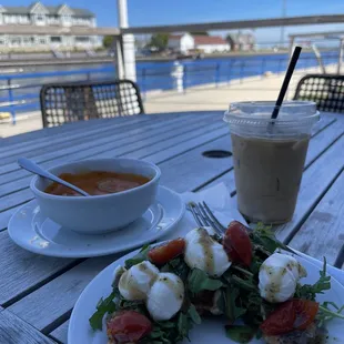 a plate of food and a cup of coffee