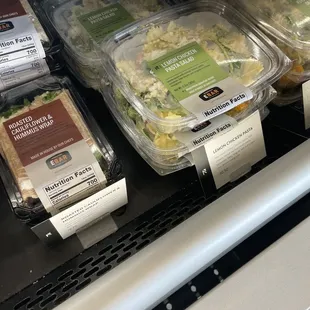 a display of frozen food in a grocery store