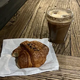 Iced coffee and ham and cheese croissant
